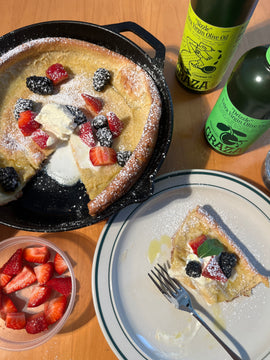 Drizzling Dutch Baby with Seasonal Fruit